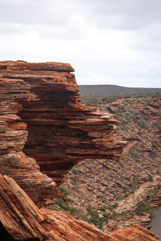 Orange and brown rock face on the edge of a cliff at Kalbarri